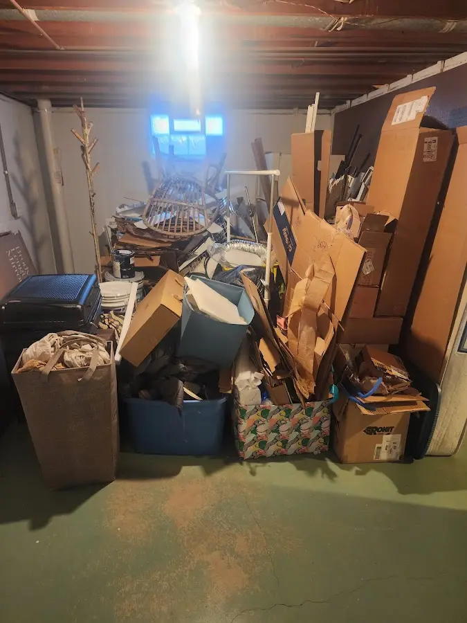 Roll-off dumpster container at job site for 6 Yard Dumpster Rental in Clifton